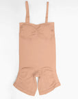 Beige romper with suspenders on a white background