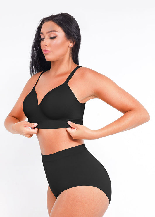 Woman wearing a black bikini set on a white background