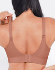 Brown bra worn by a person on a white background