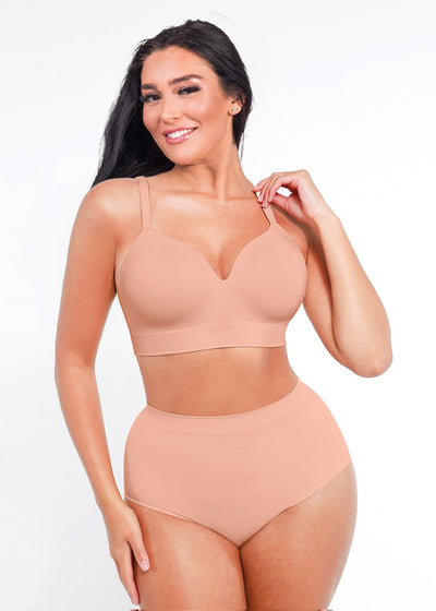 Woman wearing a beige shapewear bodysuit on a white background