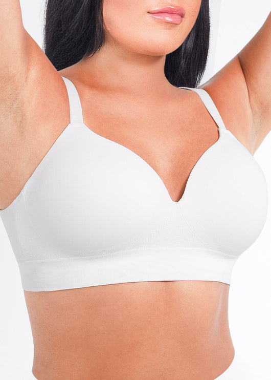 White bra worn by a person on a white background