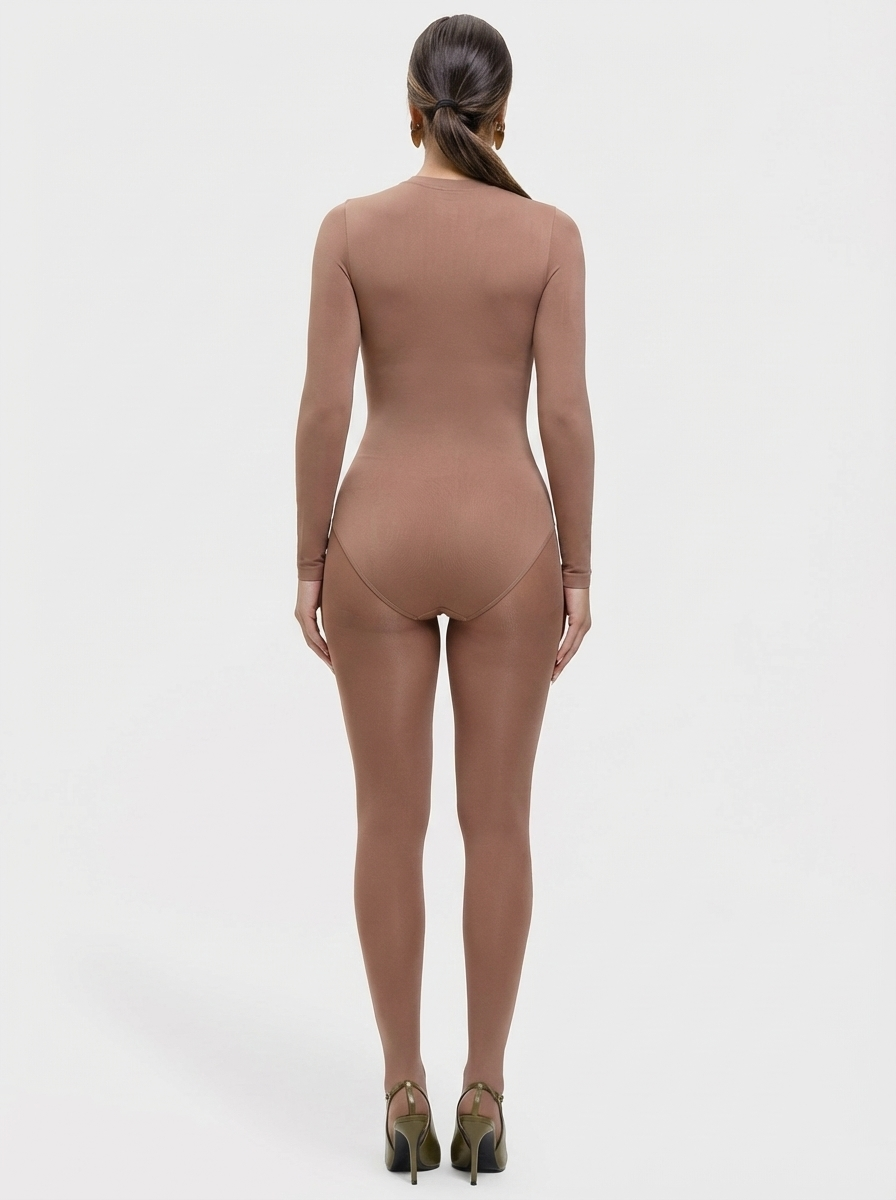 Brown bodysuit worn by a model on a white background